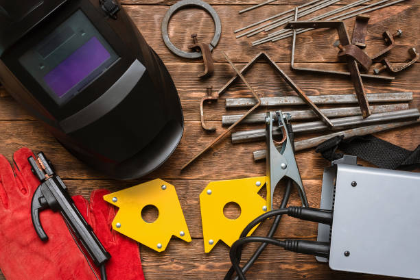 welding equipment flat lay concept background.